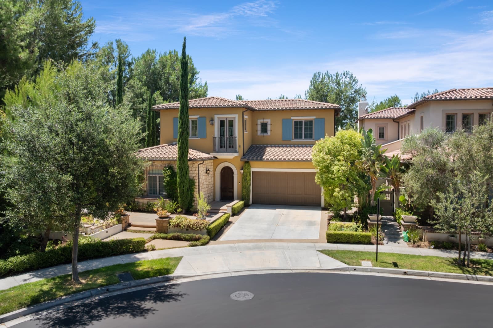 Aerial daytime view of a two-story Mediterranean home at 2 Lowland